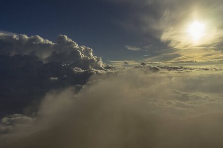 Views to the clouds from Kerinci volcano summit many sulphur gas around coming from the crater depths Sumatra, Indonesiaの写真素材
