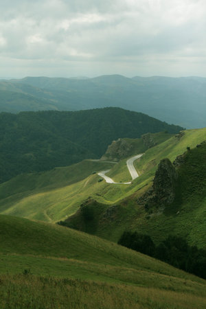 bending of asphalt road in the high mountains
