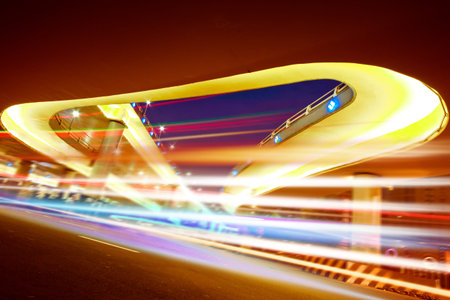 Car light trails in the road, forming a beautiful colorの写真素材