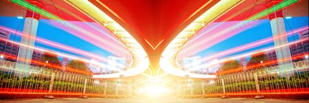 Car light trails in the road, forming a beautiful colorの写真素材