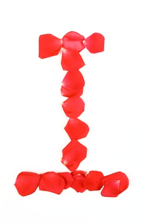 Beautiful made from red Rose petals Letter isolated on a white backgroundの写真素材