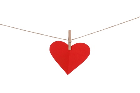 Blank paper cards hanging on clothespinsの写真素材