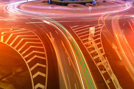 beautiful light trail at the busy highway