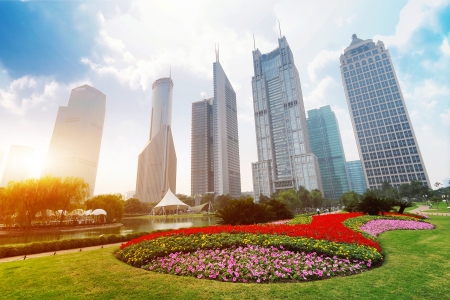 The light trails on the modern building background in shanghai chinaの写真素材