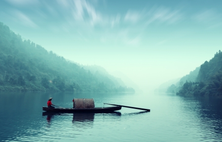 Small beautiful Dongjiang River landscape, the fishermenの写真素材