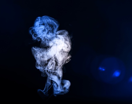 smoke isolated on a black backgroundの写真素材