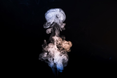 smoke isolated on a black backgroundの写真素材