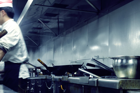 motion chefs of a restaurant kitchenの写真素材