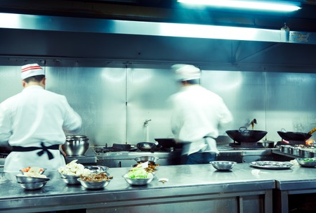 motion of chefs in the restaurant kitchenの写真素材