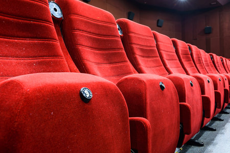 Empty movie theater with red seatsのeditorial素材