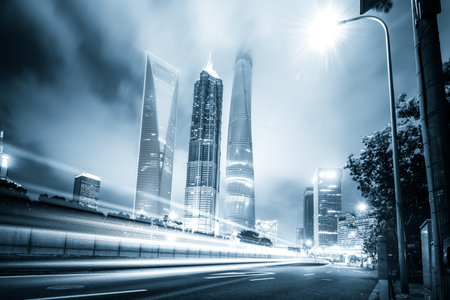 the light trails on the modern building background in shanghai china