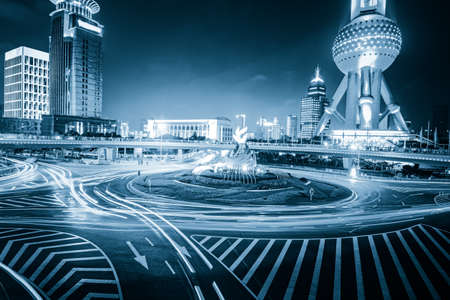 Mdern buildings background with light trails in Shanghai Chinaのeditorial素材