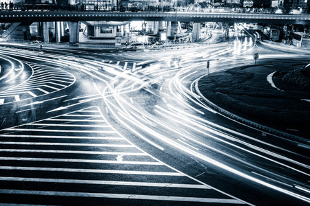 the light trails on the modern building background in shanghai china.