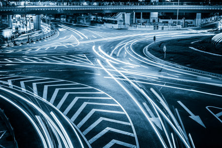 the light trails on the modern building background in shanghai china.