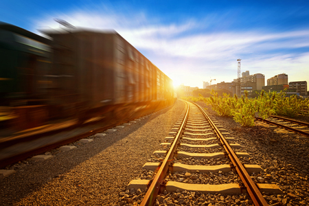 Cargo train platform at sunset with containerのeditorial素材
