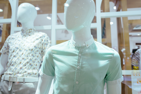 Boutique display window with mannequins in fashionable dressesのeditorial素材