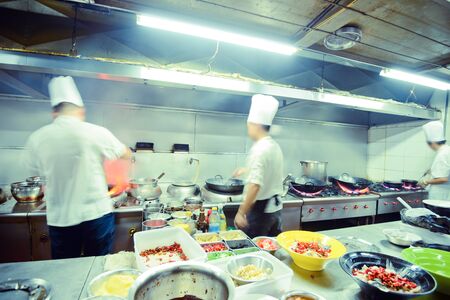 motion chefs of a restaurant kitchenのeditorial素材