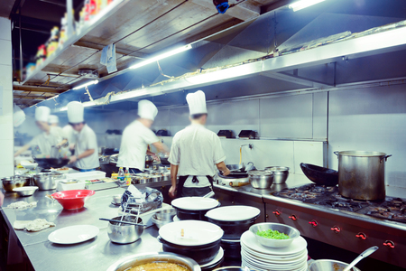 motion chefs of a restaurant kitchenのeditorial素材