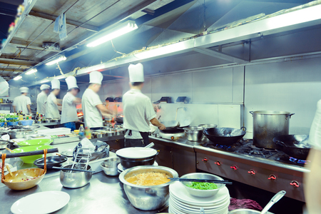 motion chefs of a restaurant kitchenのeditorial素材