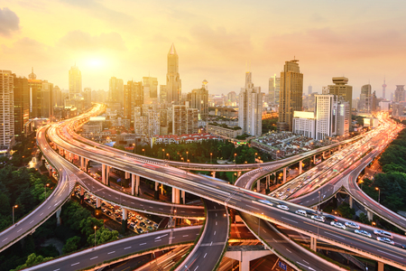 shanghai elevated road junction and interchange overpass at nightの写真素材