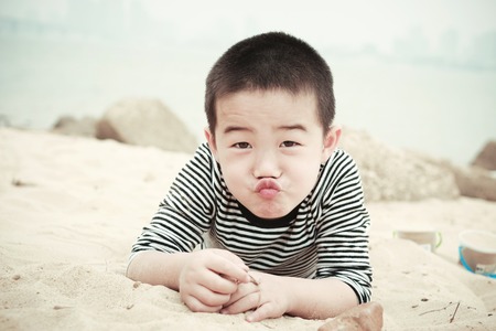 The beach asian boy, 5 years oldの写真素材