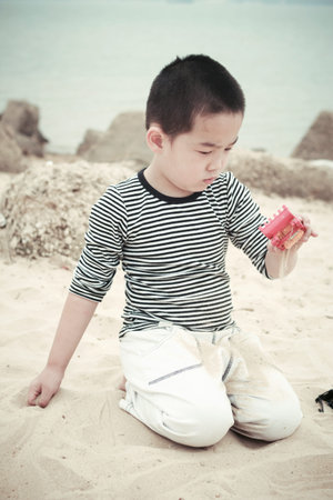 The beach asian boy, 5 years old