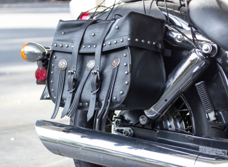 Details of black cruiser motorcycle, side viewの写真素材