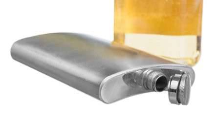 Stainless steel pocket hip flask isolated on white backgroundの写真素材