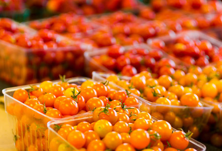 Cherry tomatos on local farmers market. Vegetable background.