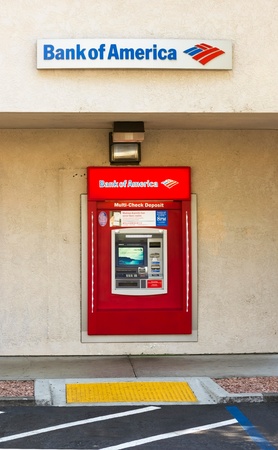 SACRAMENTO, USA - SEPTEMBER 5: Bank of America ATM machine on September 5, 2013 in Sacramento, California. The Bank of America Corporation is an American multinational banking and financial services corporation pronounced the second largest bank holding cのeditorial素材
