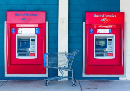 SACRAMENTO, USA - SEPTEMBER 23: Bank of America ATMs on September 23, 2013 in Sacramento, California. The Bank of America Corporation is an American multinational banking and financial services corporation.のeditorial素材