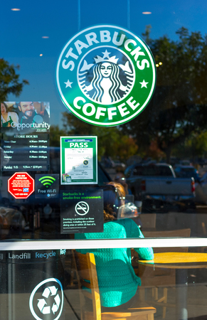 SACRAMENTO, USA - SEPTEMBER 23:  Starbucks store on September 23, 2013 in Sacramento, California. Starbucks Corporation is an American global coffee company and coffeehouse chain.のeditorial素材