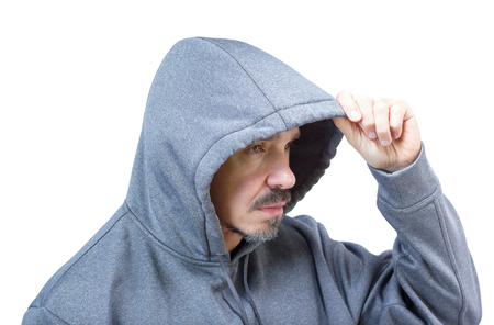 Head shot of adult caucasian man in hooded sweatshirt isolated on white background.の写真素材