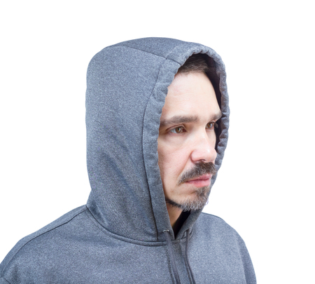 Head shot of adult caucasian man in hooded sweatshirt isolated on white background.の写真素材