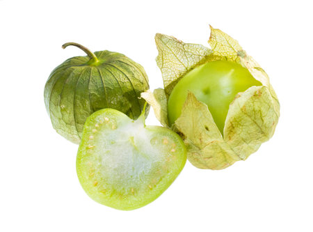 Center cut, peeled and whole tomatillo isolated on white background.
