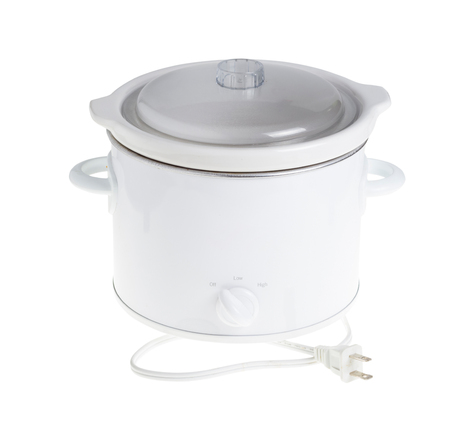 Slow cooker isolated on white background with electric plug.の写真素材