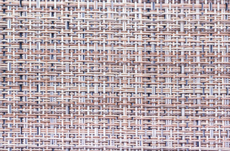 Crude beidge woven canvas macro shot background.