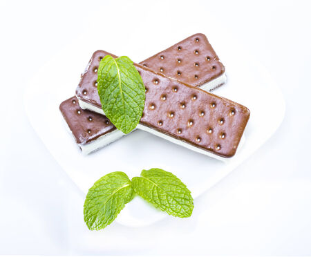Ice cream sandwich served with mint.の写真素材