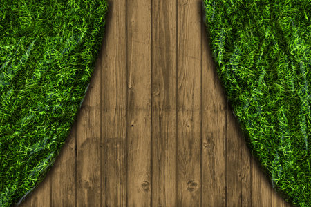 Wooden wall with a curtain of grassの写真素材