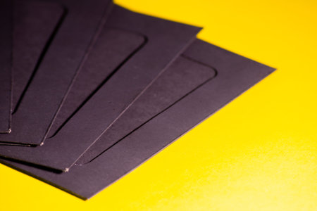 Black photo frames on yellow background