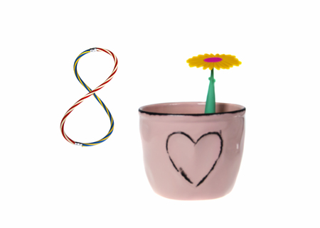 International Womens Day Greeting Card on March 8th as a flower in a pot with a heartの写真素材