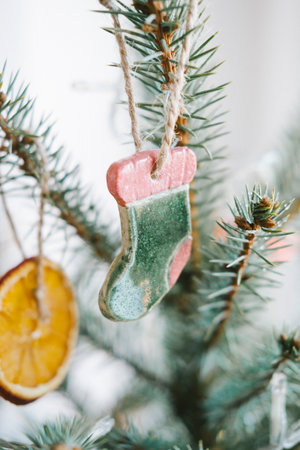 Christmas tree with green sock on it. Christmas and New Year conceptの写真素材