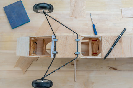 armed with wooden plane to radio controlの写真素材