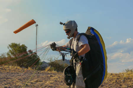paraglider pilot assembling equipmentのeditorial素材