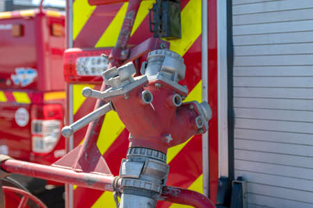 Hose coupling on the fire hydrant in pumperの写真素材