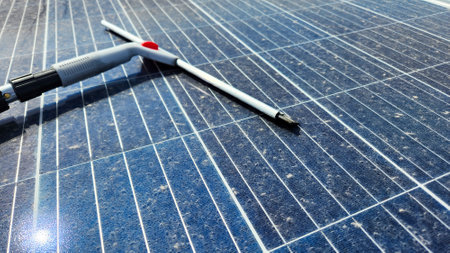 Cleaning dirty solar panels. Maintenanceの写真素材