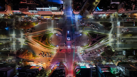 Aerial view of the Buenos Aires Obelisk at night. Zenithal view over the traffic.の写真素材
