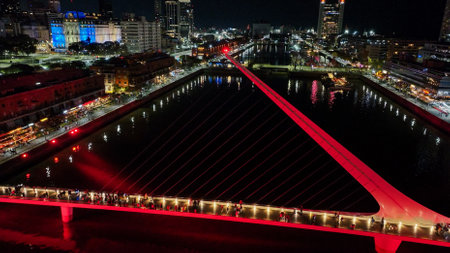 Urban landscape of Puerto Madero at sunset, with the city of Buenos Aires in the background. Aerial night view.の写真素材