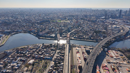 Aerial view of the La Boca neighborhood in Buenos Aires. The city of Buenos Aires can be seen in the background.の写真素材