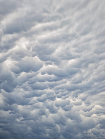Vertical shot of a dramatic cloudy sky perfect for mobile wallpapers and social media.